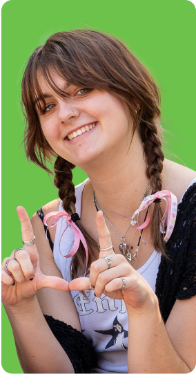 University of Utah student making a U sign